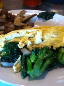 Broccoli and spinach omelet with home fries